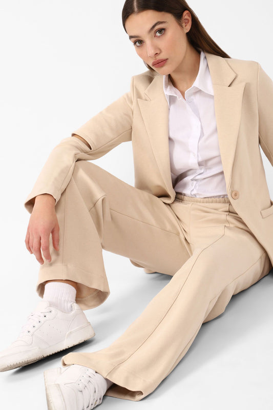 Straight trousers in single-colour pure cotton with vertical pockets